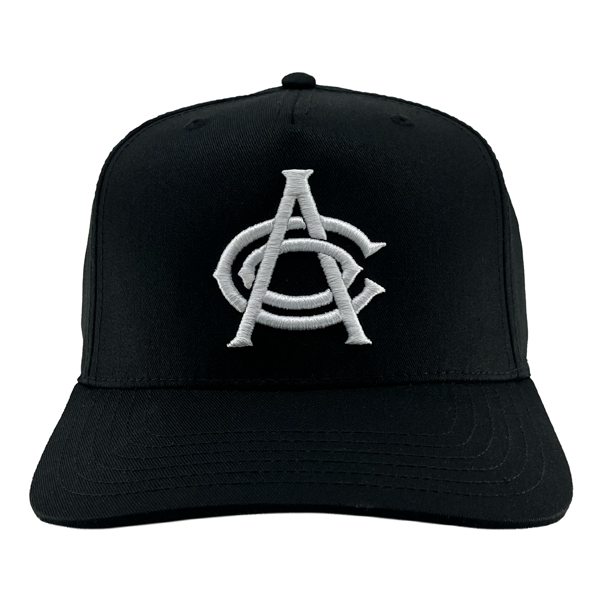 Introducing the OAC Logo 5 Panel by OAC—a black snapback cap featuring a white embroidered logo of interlocking “A” and “C” letters in a bold, stylized font, representing the Oakland Athletic Club. This cap is designed with a curved brim and visible stitching on both the bill and crown, showcased against a plain white background.