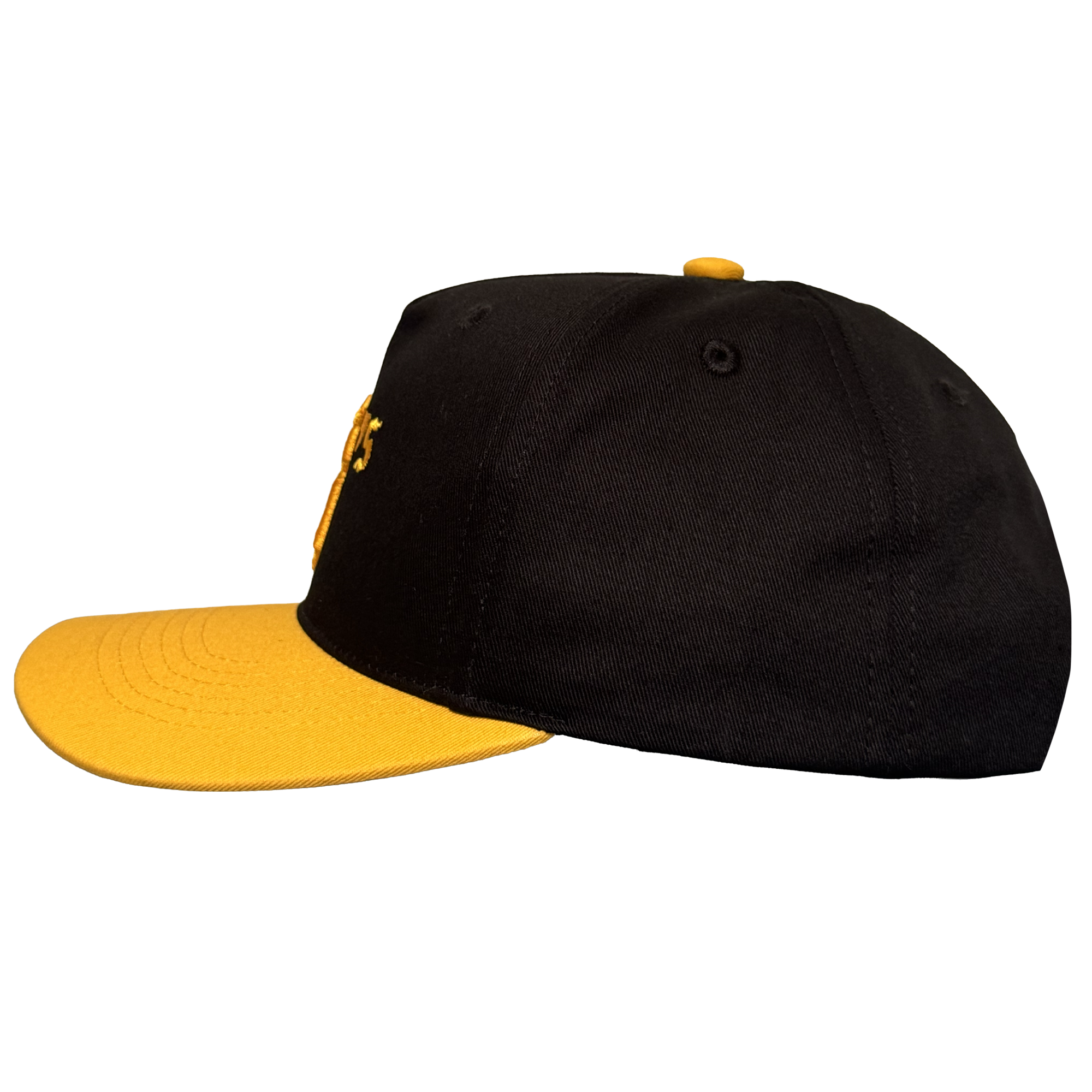 The Oakland Ballers 5 Panel Cap by Oakland Ballers is a black snapback with a yellow brim and button, visible stitching, eyelets, and part of a yellow embroidered letter—ideal for any Oakland Ballers fan. Shown side-on on a white background.