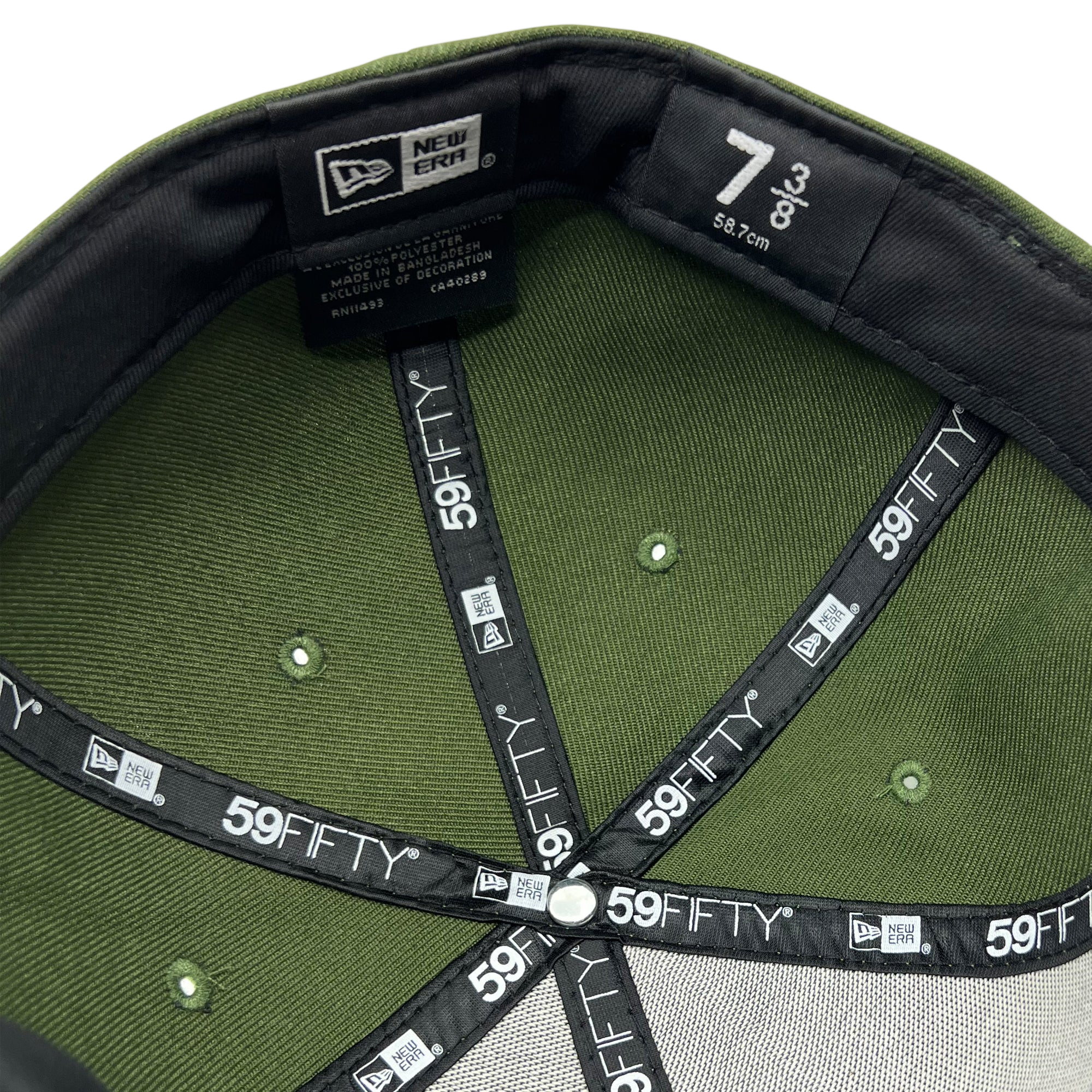 The image shows the interior of an olive green New Era Official 59FIFTY Fitted Cap by Other in size 7 (55.8 cm). The black inner tape is detailed with white “59FIFTY” branding, underscoring its authenticity as a true fitted cap. The sweatband inside is black, and metal rivets are visible on the olive green panels.