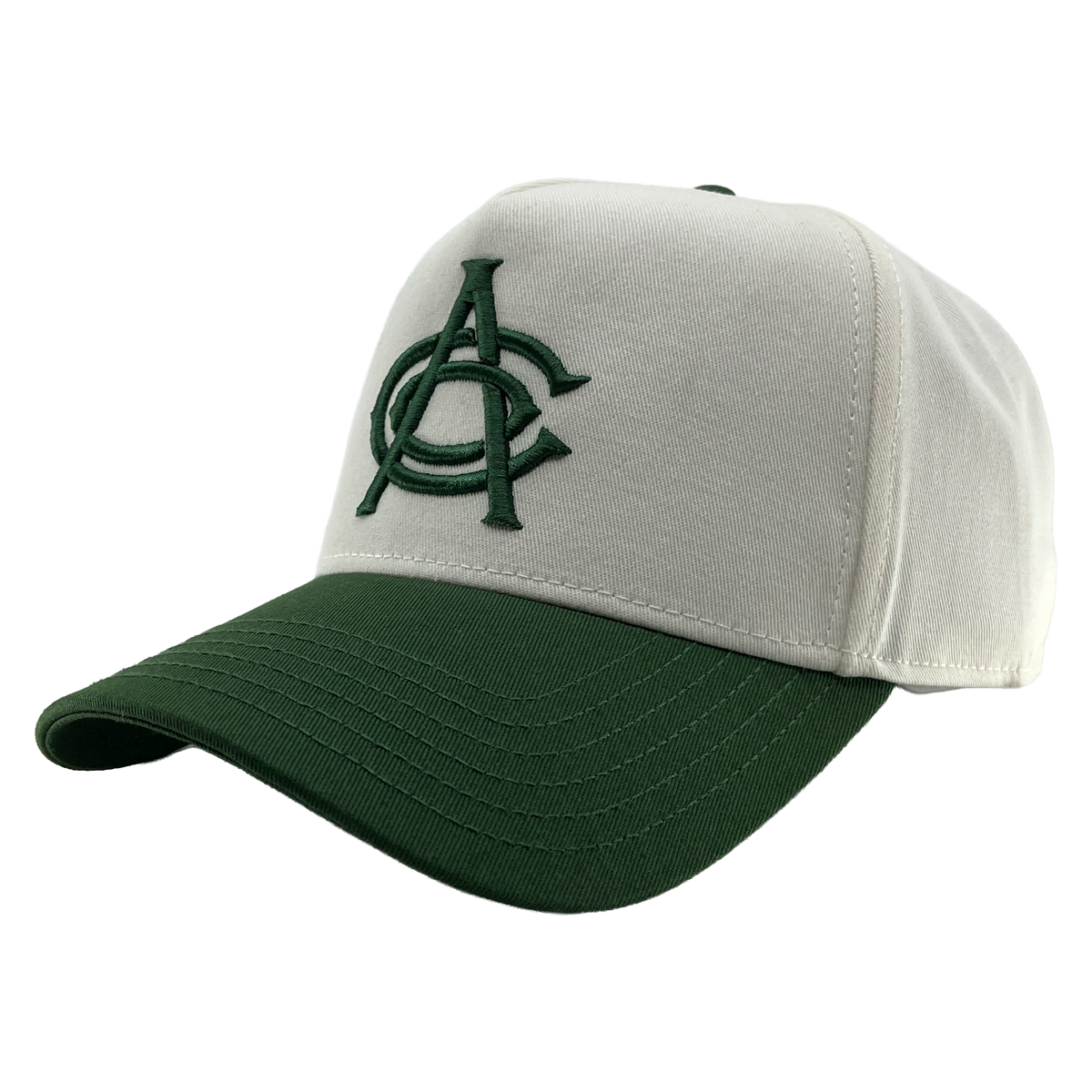 The OAC Logo 5 Panel by OAC is a white snapback cap with a dark green brim, featuring an embroidered green interlocked “A” and “C” logo on the front for the Oakland Athletic Club. Visible stitching accents the bill and crown, and it’s shown against a plain white background.