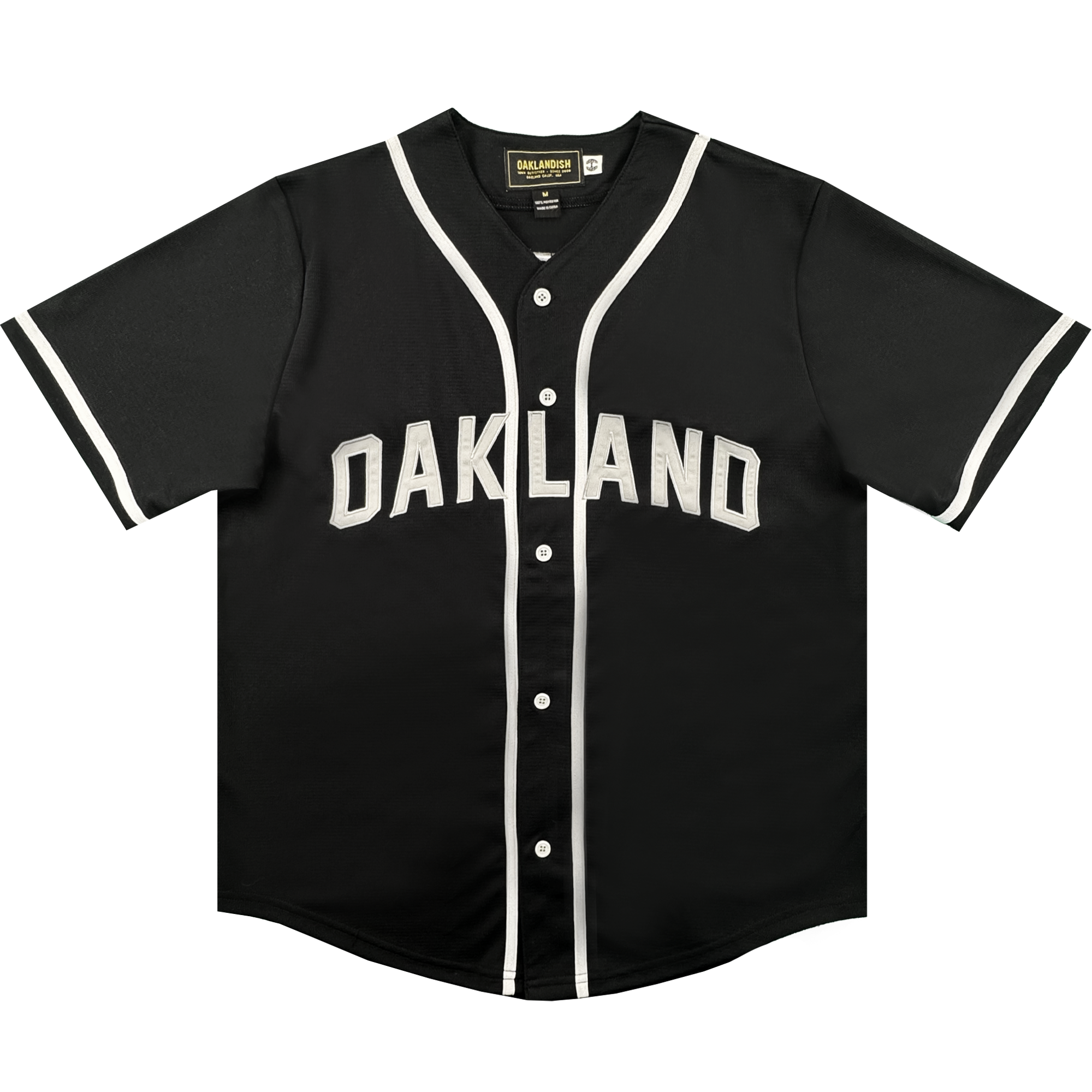 Here’s a rewritten sentence using your product data: The ORSC Button Up Jersey by Oakland Roots SC is a black short-sleeve baseball jersey with white trim on the sleeves and collar, featuring "OAKLAND" in bold white letters across the chest. Inspired by the Oakland Roots Sports Club, it includes white buttons down the front and a black tag at the inside collar.