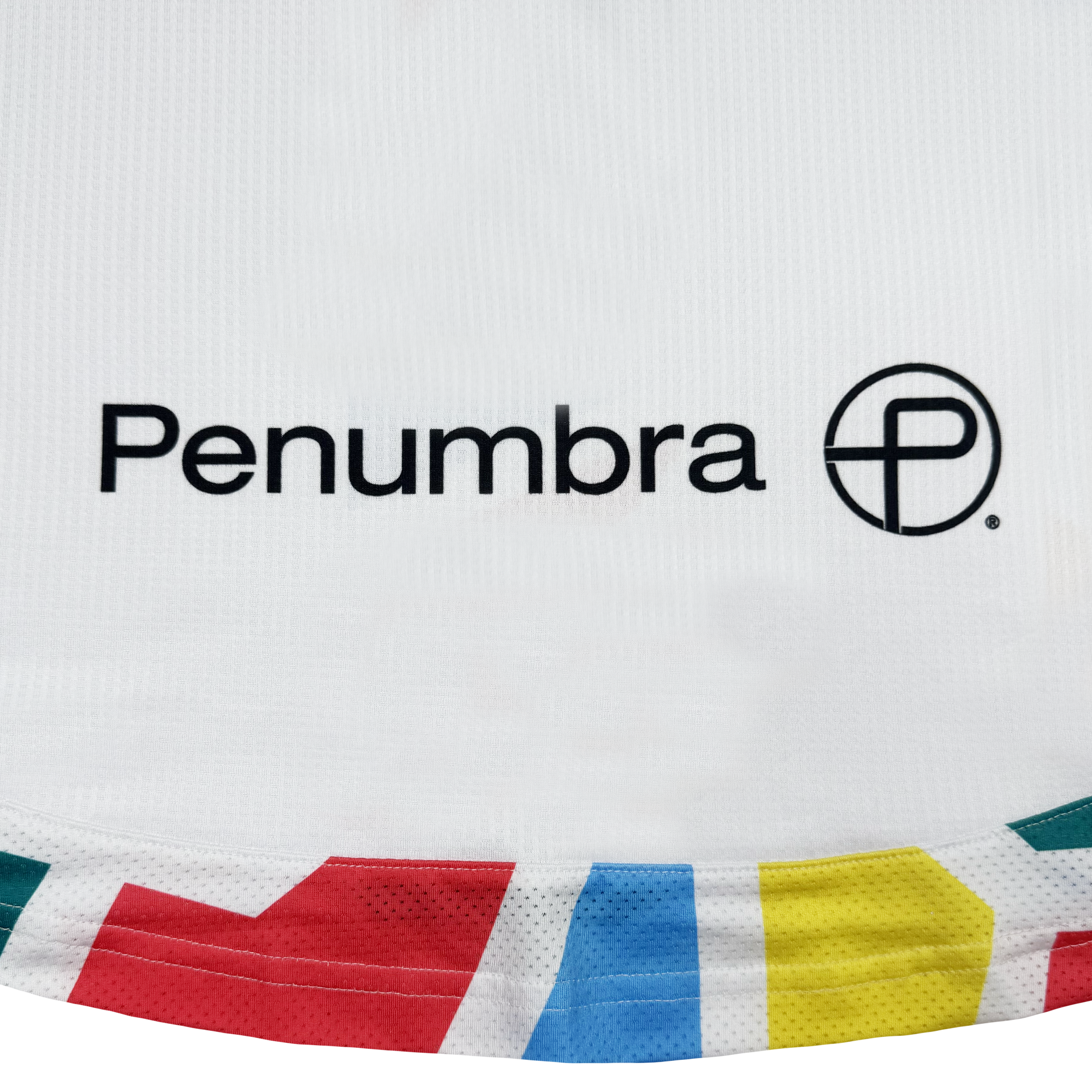 The Oakland Roots SC Custom Unisex Mosaic in Motion Kit is a white soccer jersey with "Penumbra," a black circular "P" logo, and a colorful geometric border inspired by the iconic Oakland Roots kit.