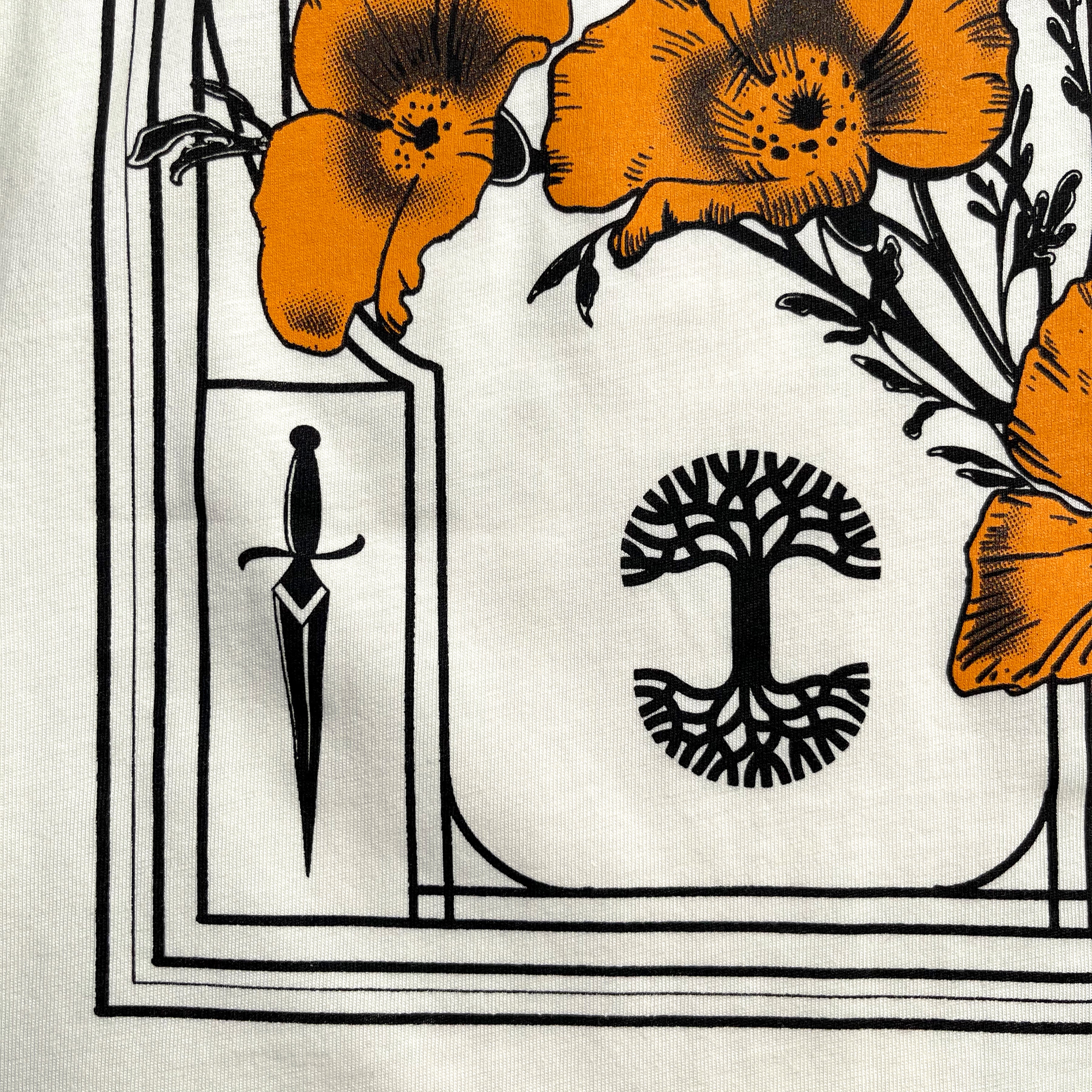 The intricate design on the Blossom Tee by Oaklandish showcases large orange poppies with black details, a small dagger on the left, and a symmetrical abstract tree symbol in the center. The artwork is presented on a light background and framed with a decorative rectangular border, all printed on a classic fit 100% cotton t-shirt.